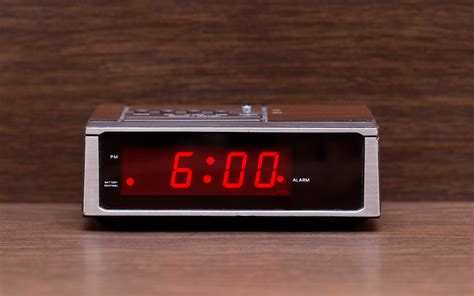 A preselected sound will be played at the set time if the alarm message appears. . Set an alarm for 6 am